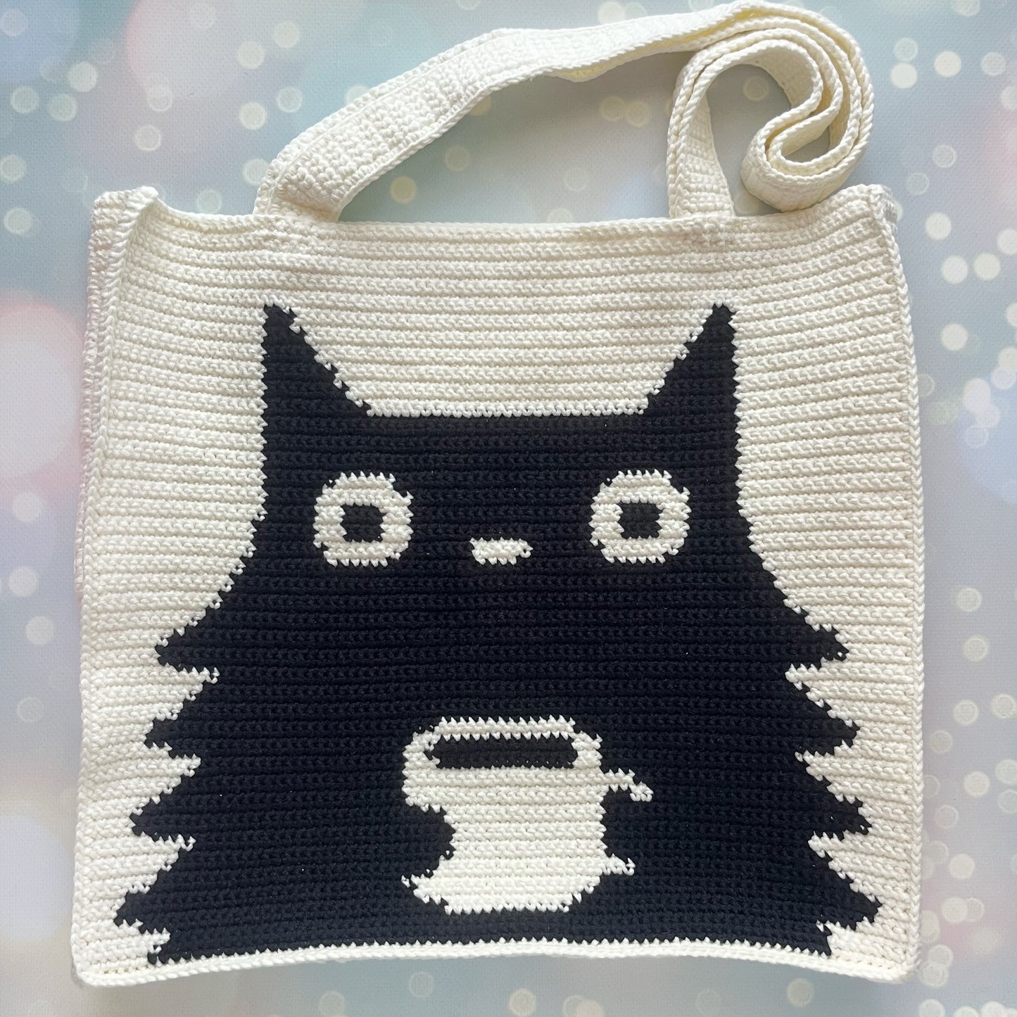 Black cat with a cup crochet pattern